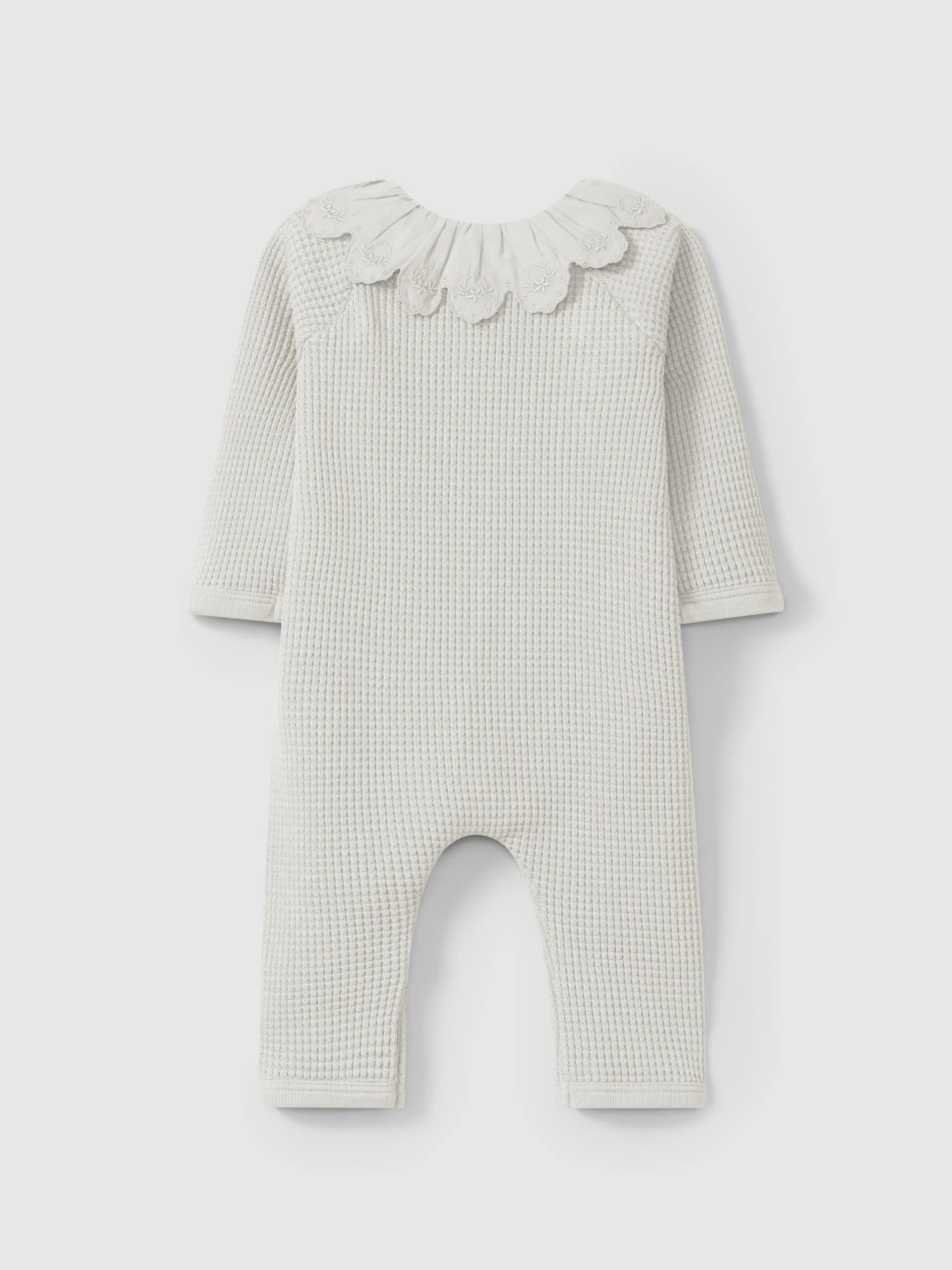 Waffle weave romper with ruffled collar